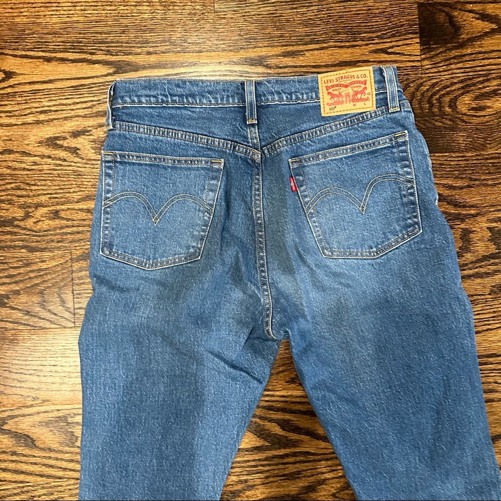 Levi's 501 distressed jeans